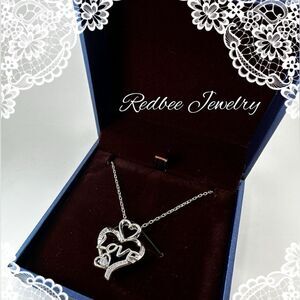 NIB Redbee 18k white GP over s925 “Love”, CZ diamond necklace!